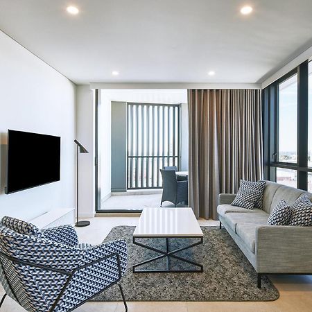 Meriton Suites Liverpool Exterior photo A living room in a typical apartment