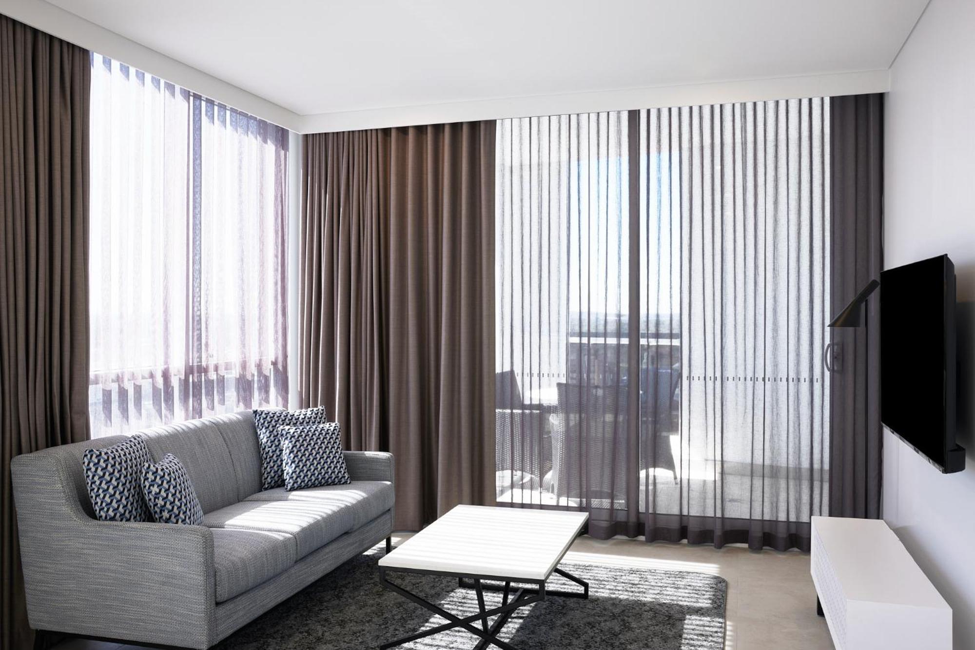 Meriton Suites Liverpool Exterior photo Curtains