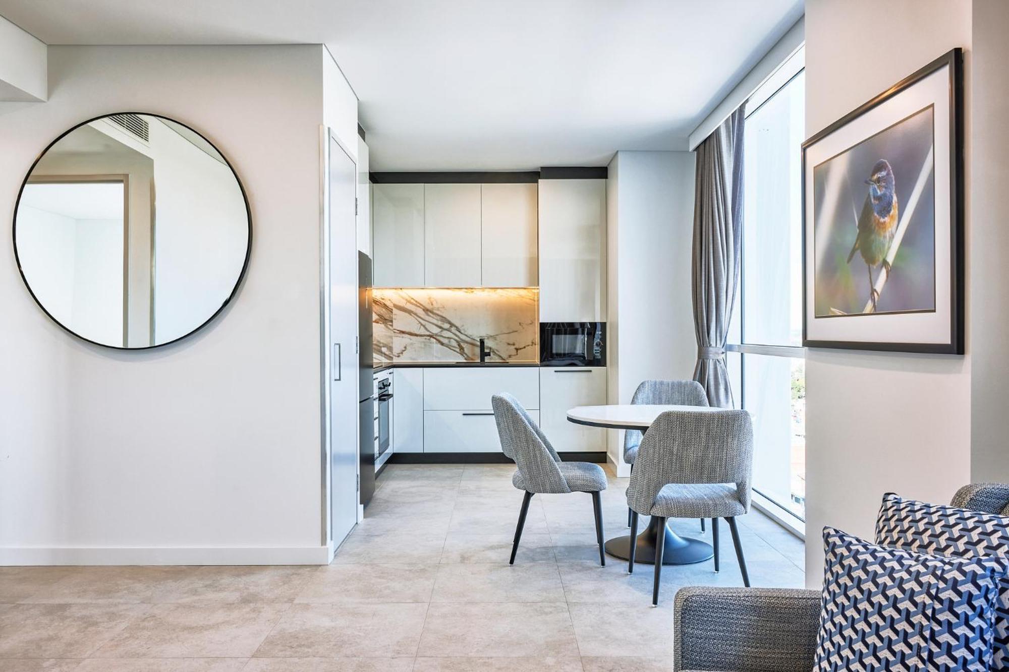 Meriton Suites Liverpool Exterior photo The kitchen in a typical apartment