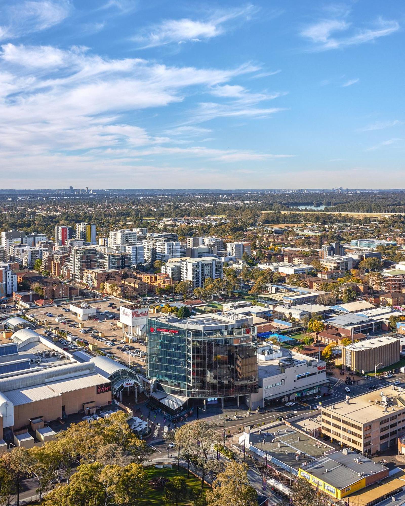 Meriton Suites Liverpool Exterior photo Aerial view of the suburb